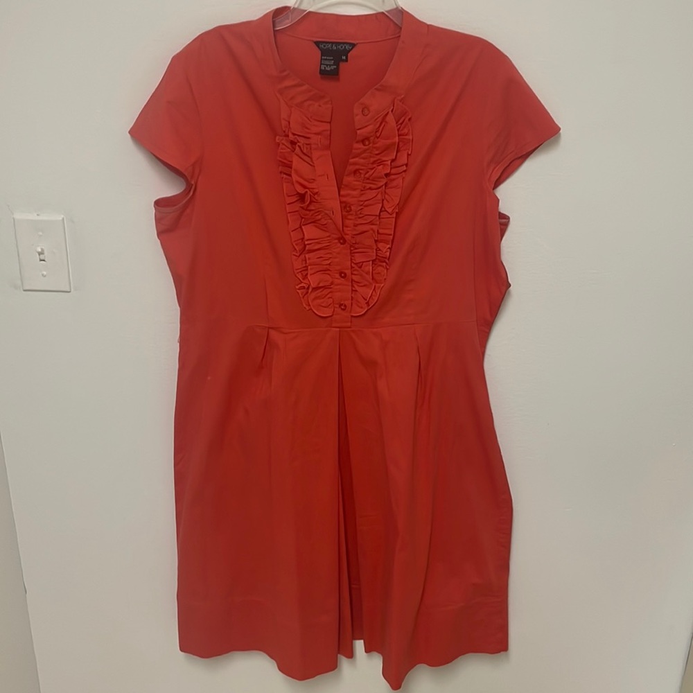 Orange dress with ruffle in the chest area belt is missing